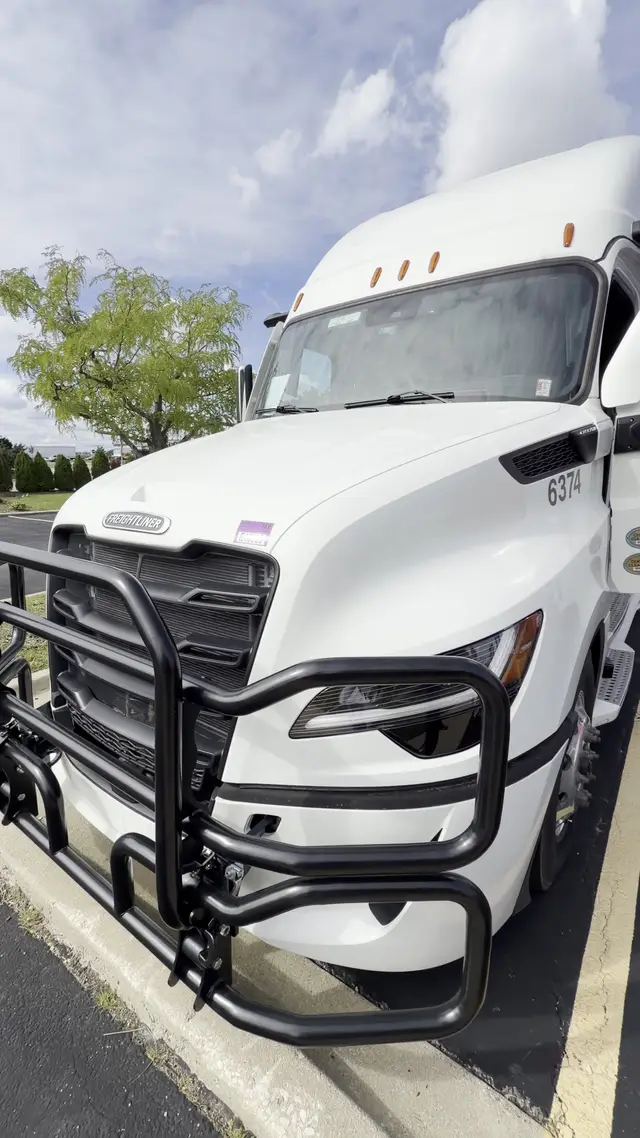 Front of a white BILATO truck at the yard